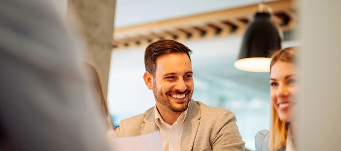 Two people in warm conversation having a Solance introductory consultation